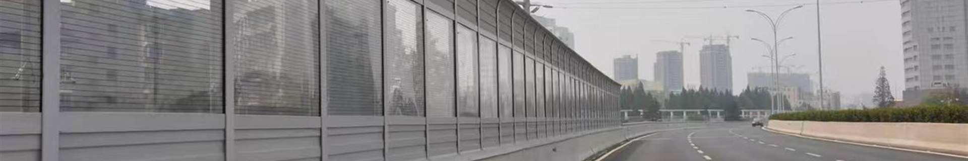 Ribbed metal panel surface resembling a sound barrier panel
