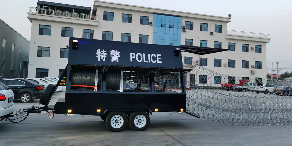 Mobile Roadblock Vehicle product image showing trailer body, warning lights and deployed barrier structure